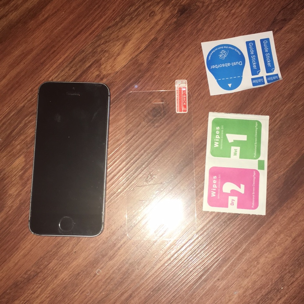 Grey iPhone 5s and tempered glass screen protector